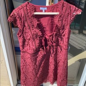 Lacey dress. More of a maroon color!
